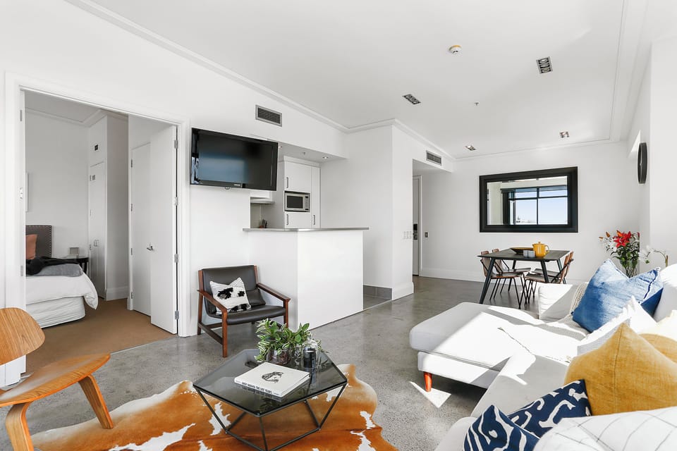 One Bedroom Apartment with Parking | Living area | 55-inch Smart TV with digital channels