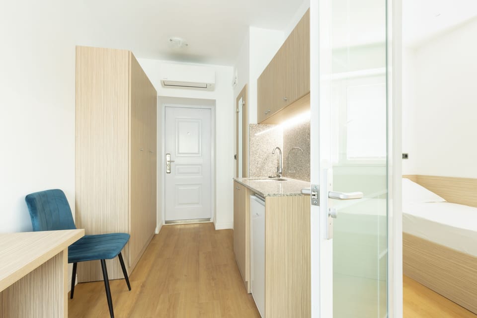 Classic Studio Suite, 2 Bedrooms, Non Smoking, City View | Desk, laptop workspace, free WiFi, bed sheets