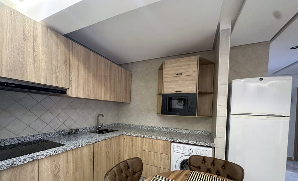 Design Apartment | Private kitchen | Full-size fridge, microwave, stovetop, cookware/dishes/utensils