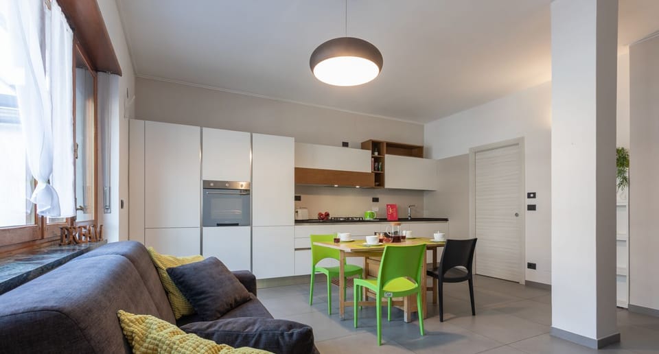 Apartment | Living area | 32-inch flat-screen TV with cable channels