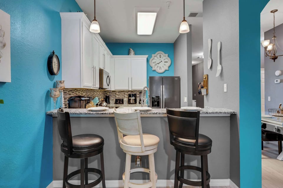 Condo, Multiple Beds, Balcony, Garden View (Oasis Hideaway at Bahama Bay) | Private kitchen | Coffee/tea maker