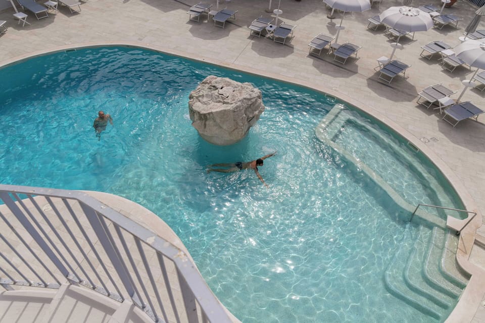 Seasonal outdoor pool, open 10 AM to 6 PM, pool umbrellas, sun loungers