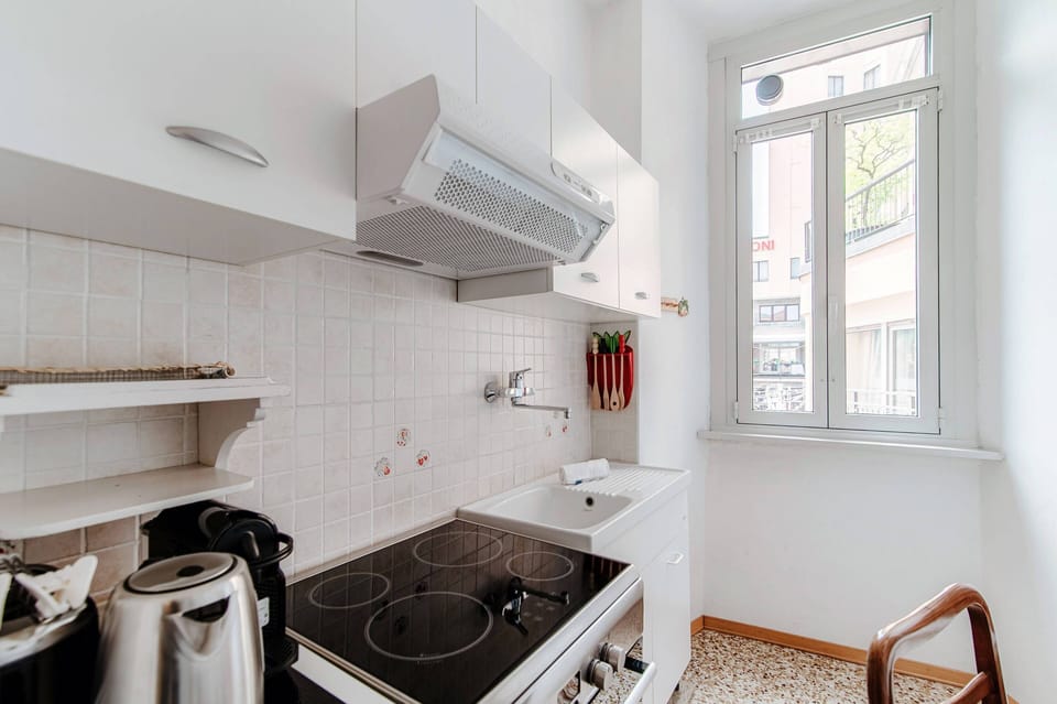 Apartment, Balcony, Lake View | Private kitchen | Full-size fridge, oven, stovetop, espresso maker
