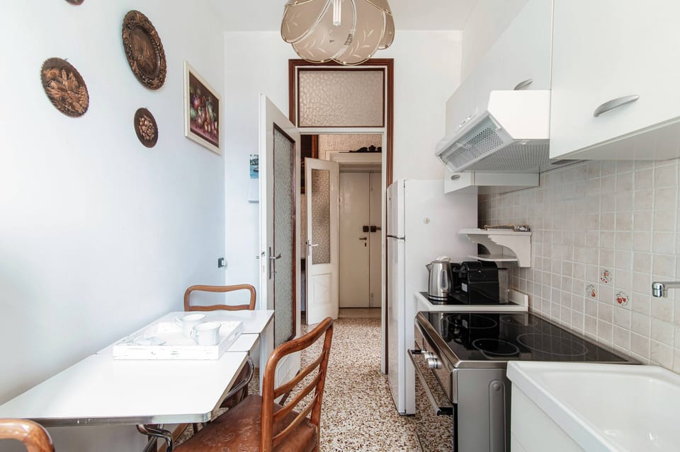 Apartment, Balcony, Lake View | Private kitchen | Full-size fridge, oven, stovetop, espresso maker