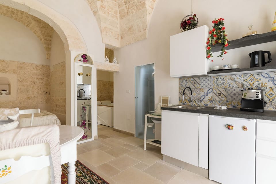 Apartment | Private kitchen | Fridge, stovetop, espresso maker, coffee/tea maker
