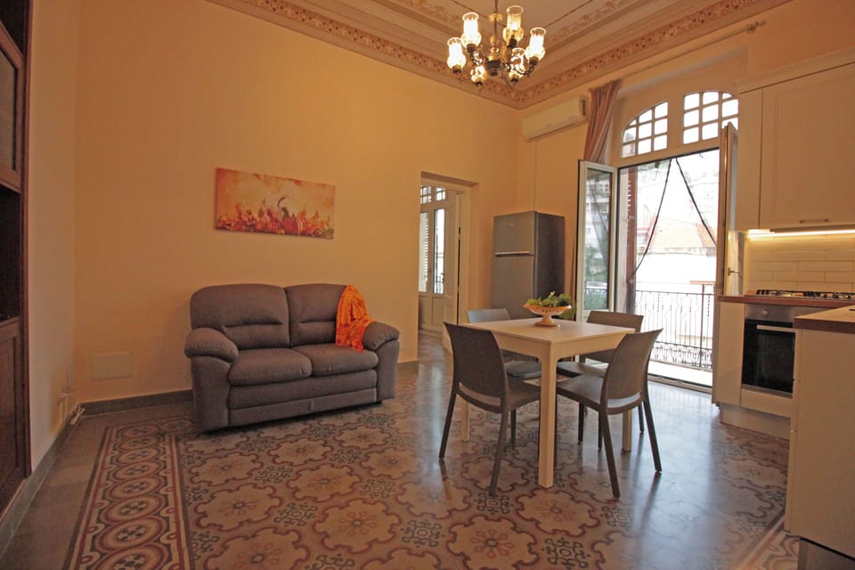 Apartment, Balcony | Living area | 35-inch TV with digital channels