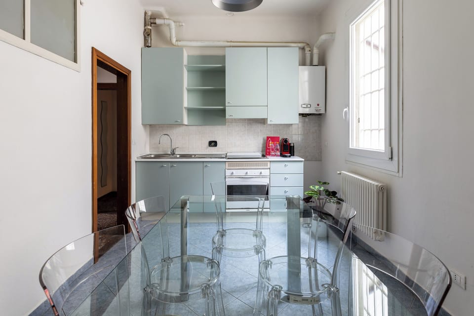 Apartment | Private kitchen | Electric kettle, dining tables