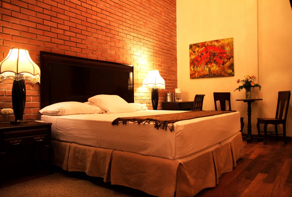 King Suite | Premium bedding, down comforters, pillowtop beds, in-room safe