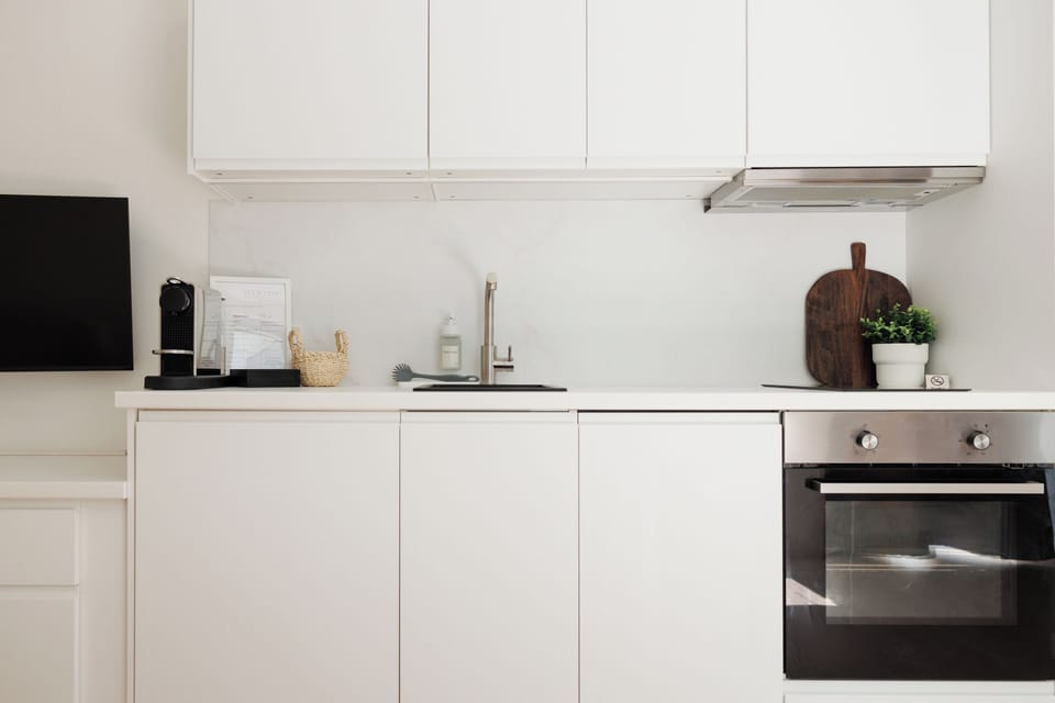 Apartment, Garden View | Private kitchen | Espresso maker, coffee/tea maker, dining tables