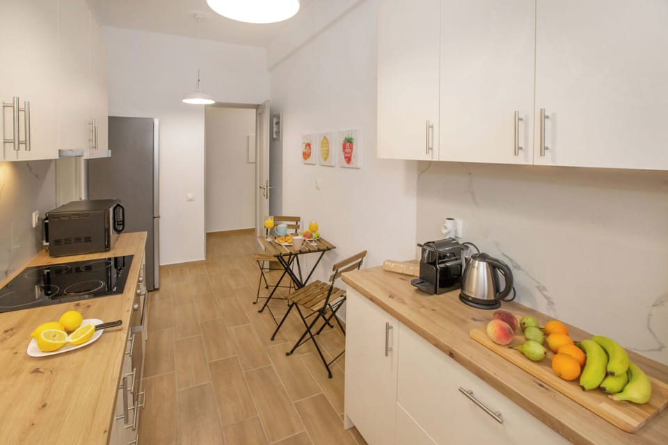 Comfort Apartment, 2 Bedrooms | Private kitchen | Full-size fridge, oven, stovetop, cookware/dishes/utensils