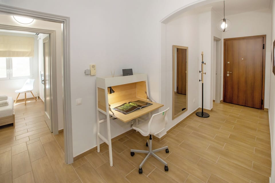 Comfort Apartment, 2 Bedrooms | Living area | 43-inch Smart TV with digital channels