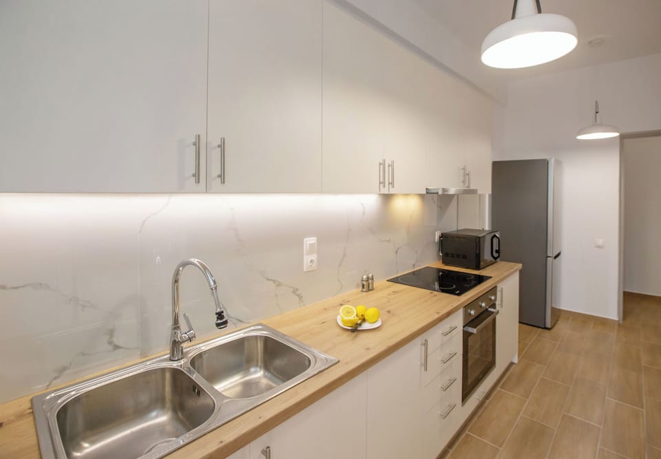 Comfort Apartment, 2 Bedrooms | Private kitchen | Full-size fridge, oven, stovetop, cookware/dishes/utensils