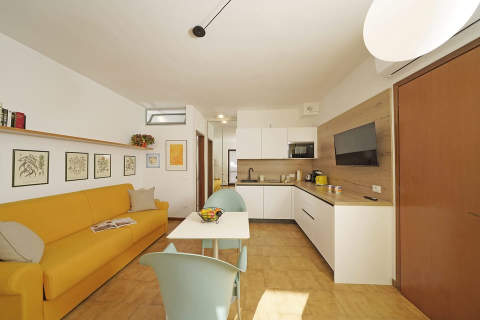 Apartment, Pool View | Private kitchen | Electric kettle, toaster