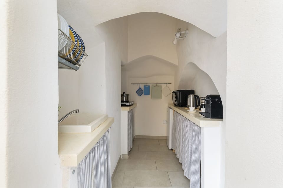 Apartment | Private kitchen | Full-size fridge, stovetop, espresso maker, cookware/dishes/utensils