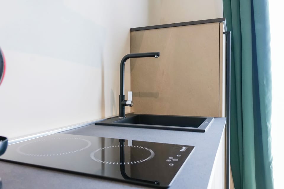 Family Suite, Balcony, City View | Private kitchenette | Espresso maker, coffee/tea maker, electric kettle, coffee grinder