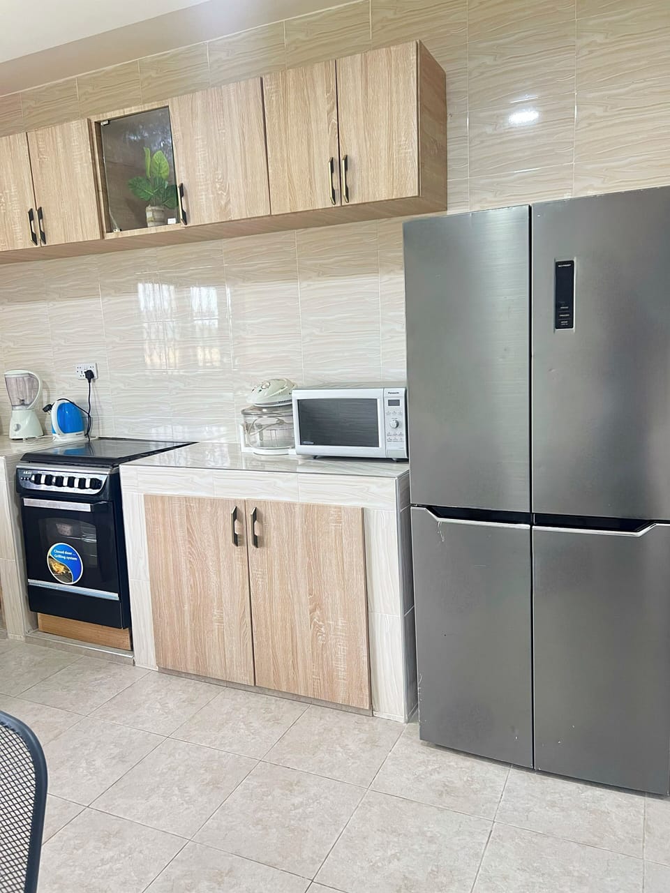 Full-size fridge, microwave, rice cooker, cookware/dishes/utensils
