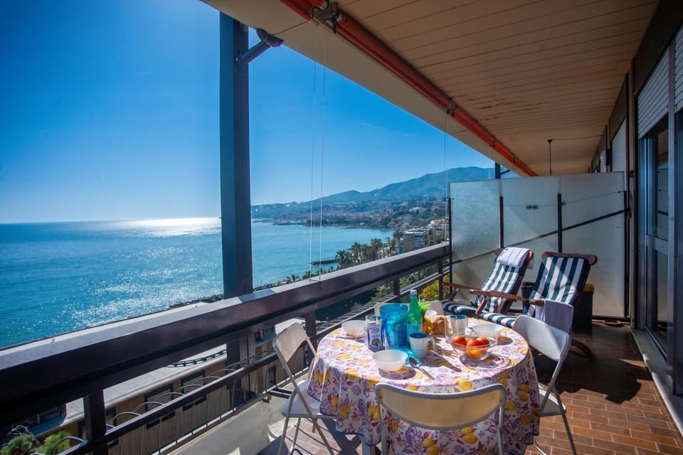 Family Apartment, 1 Bedroom, Balcony (Sole Surf E Relax) | Outdoor dining
