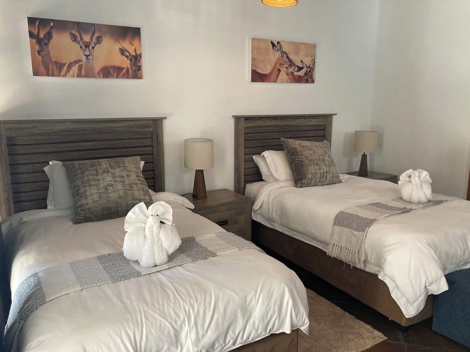Deluxe Double or Twin Room, Private Bathroom, Pool View | In-room safe, desk, laptop workspace