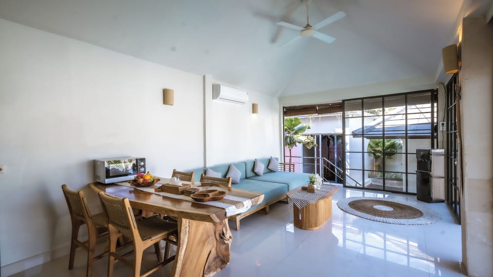 Basic Villa, Patio, Pool View | Living area | 43-inch TV with cable channels