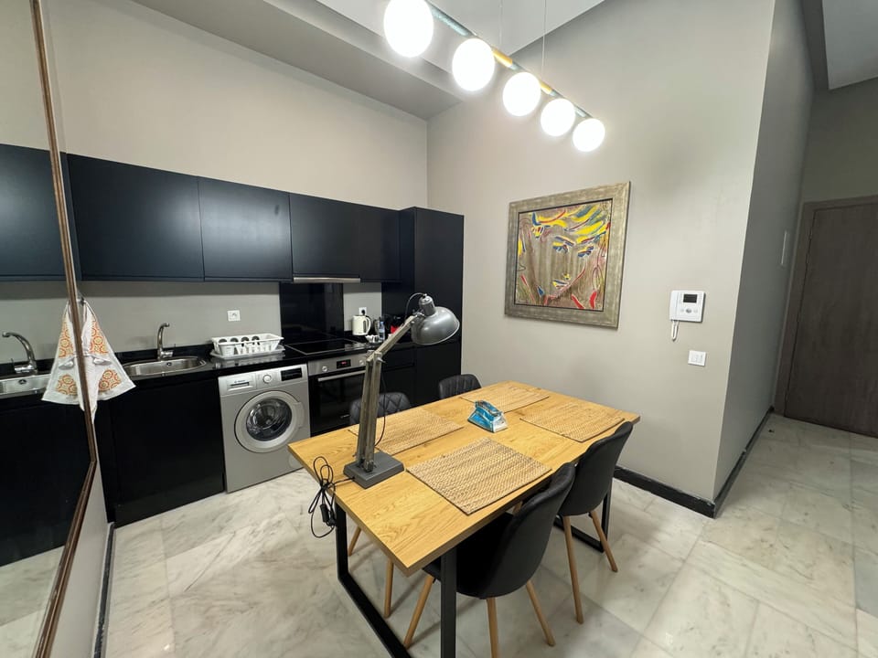 Luxury Apartment | Private kitchen | Espresso maker, coffee/tea maker, electric kettle, dining tables