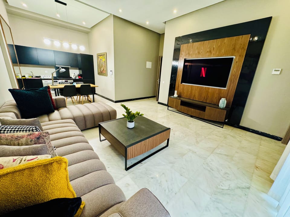 Luxury Apartment | Living area | 60-inch LED TV with satellite channels, Netflix, streaming services