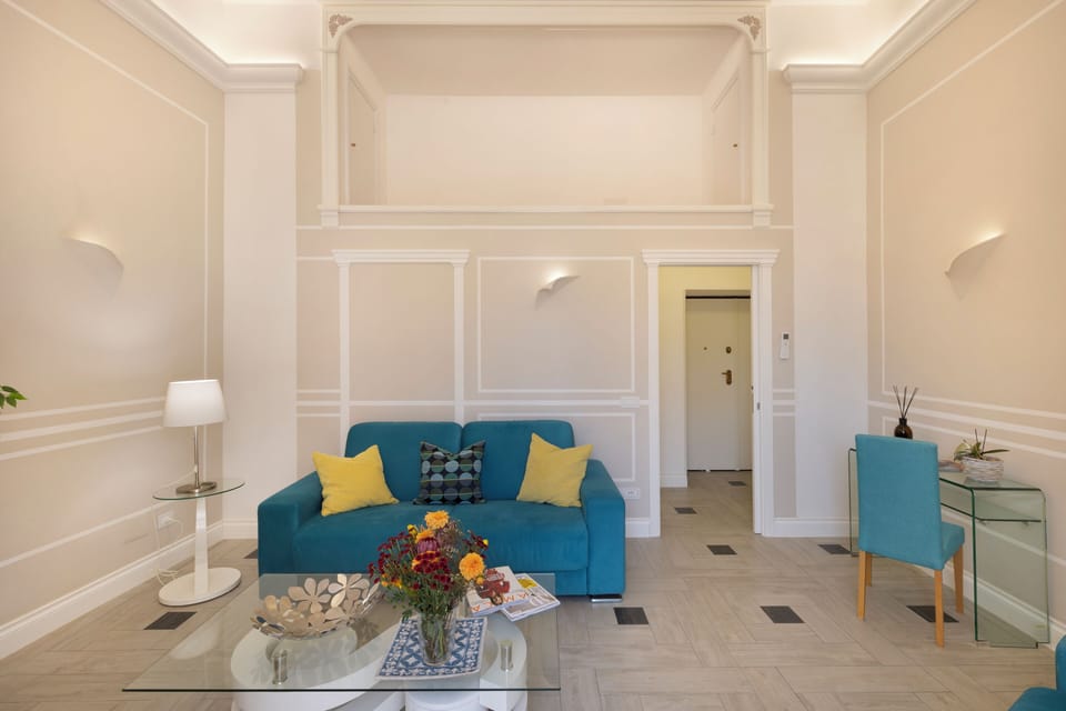 Luxury Apartment, City View | Living area | 32-cm flat-screen TV with digital channels