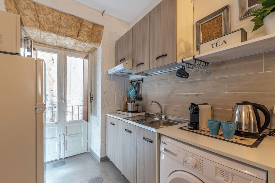 Apartment | Private kitchen | Fridge, microwave, stovetop, espresso maker