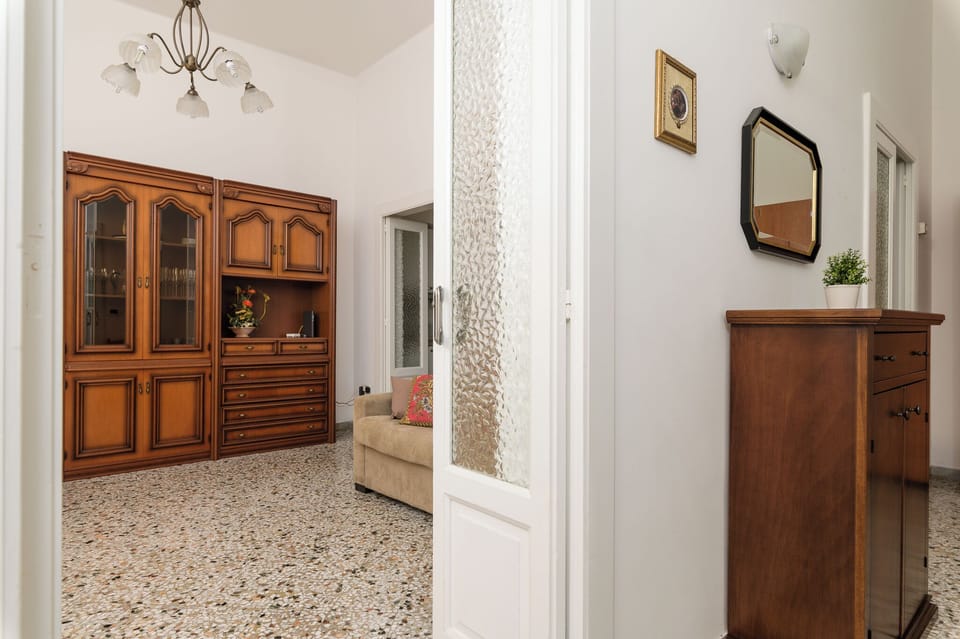 Apartment | Living area | 32-inch flat-screen TV with cable channels