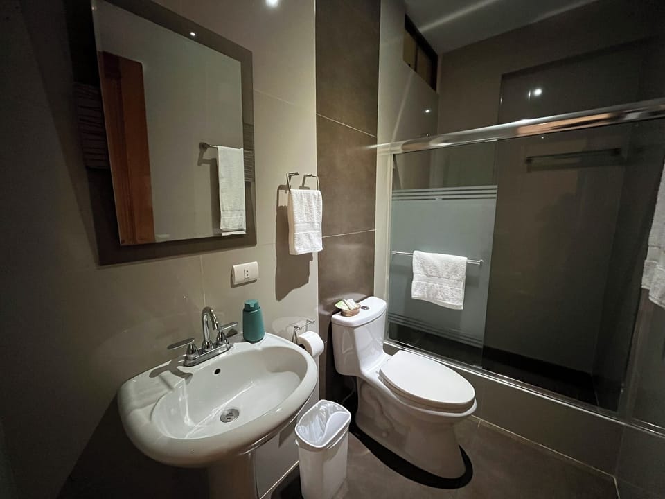 Comfort Double Room, Garden View, Ground Floor | Bathroom | Shower, towels, soap, shampoo