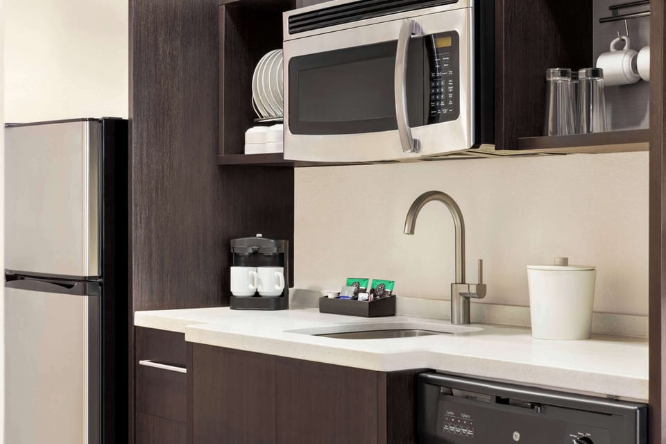 Studio Suite, 1 King Bed, Non Smoking | Private kitchen | Full-size fridge, microwave, dishwasher, coffee/tea maker
