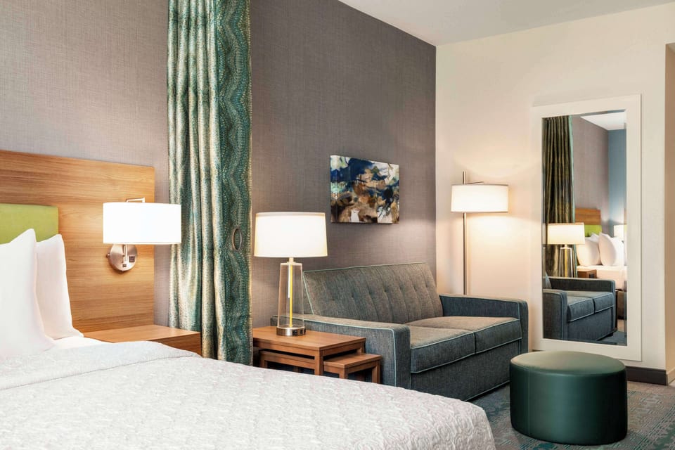 Studio, 1 Queen Bed, Non Smoking | Living area | 48-inch LCD TV with premium channels, TV, MP3 dock