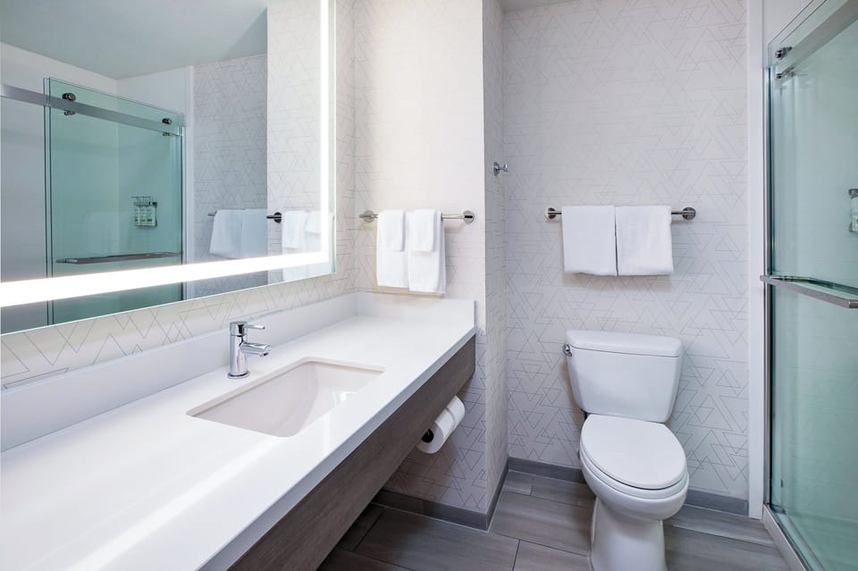 Suite, 1 King Bed (Extra Floor Space) | Desk, laptop workspace, blackout drapes, iron/ironing board