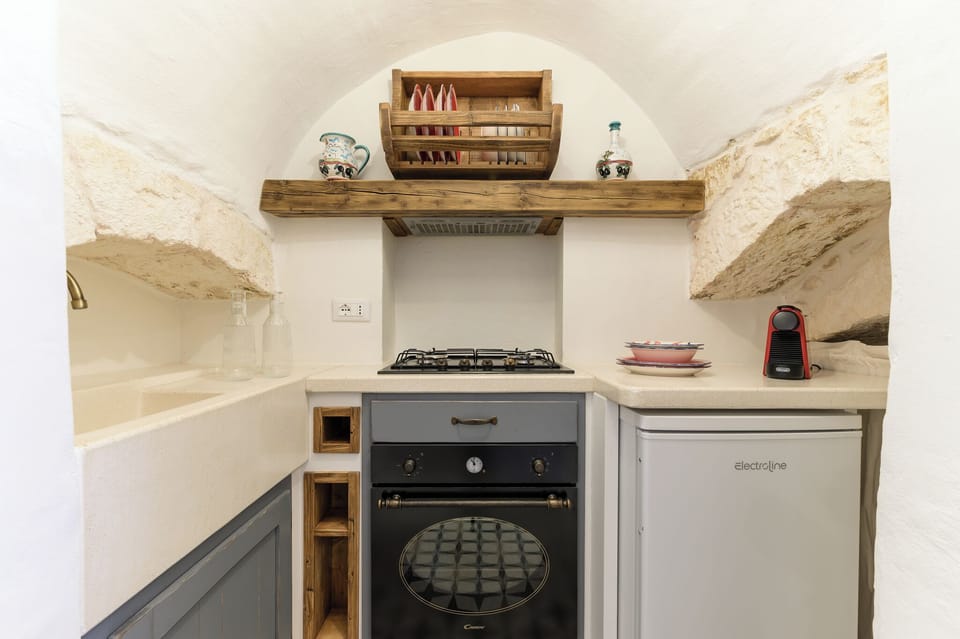 Apartment | Private kitchen | Espresso maker, dining table