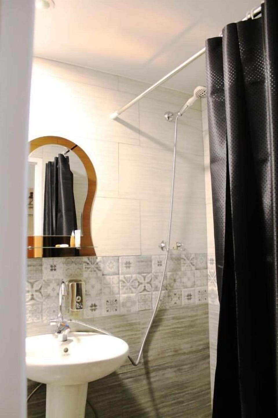 Separate tub and shower, slippers, towels, soap