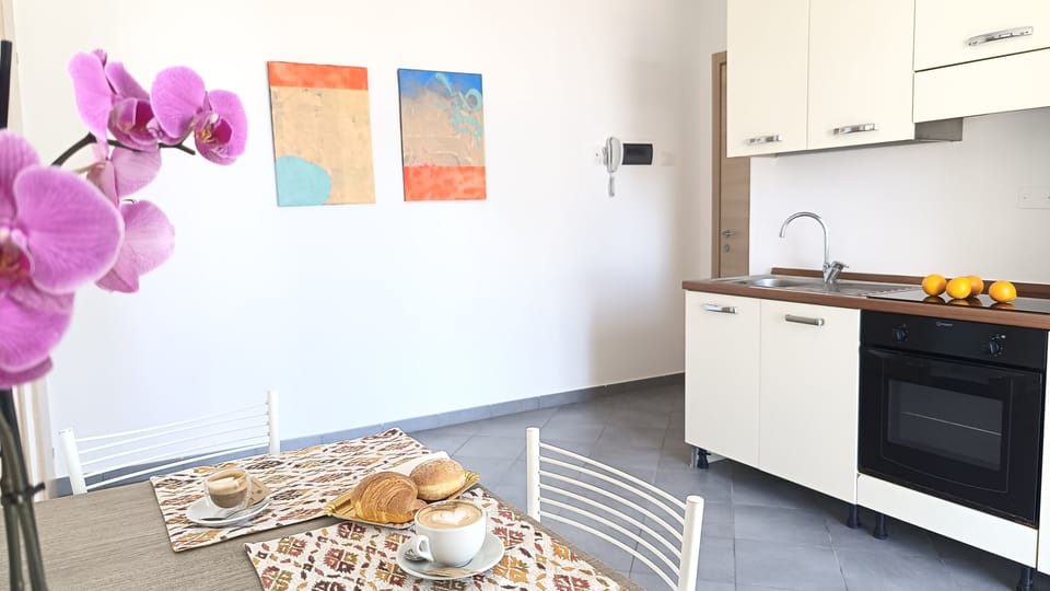 Standard Apartment, Balcony, Beach View | Living area | TV