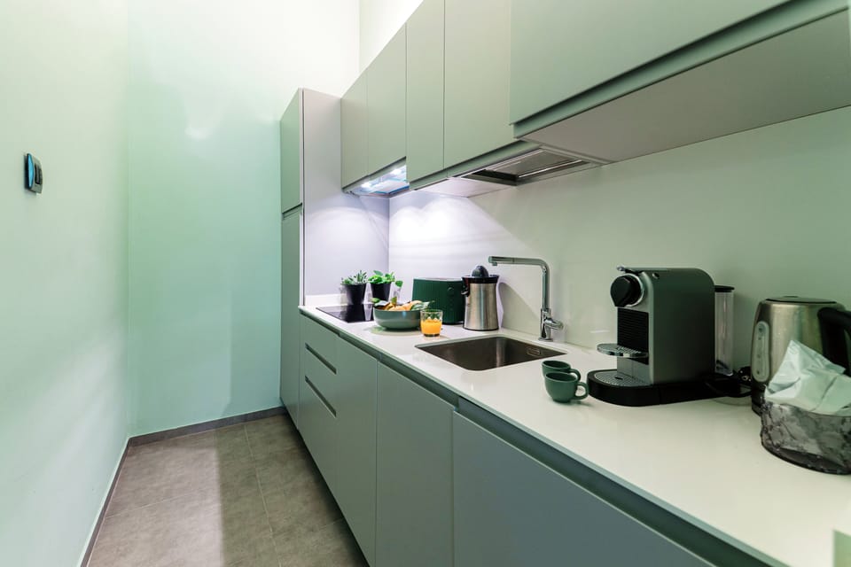 Apartment, Pool View | Private kitchen | Full-size fridge, microwave, stovetop, dishwasher