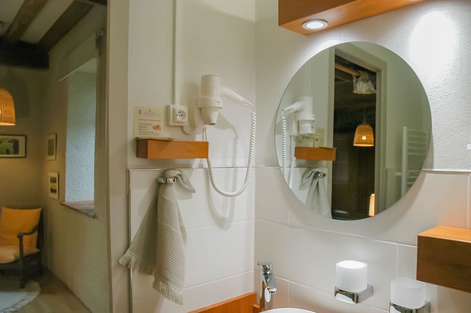 Comfort Room, Garden View | Bathroom | Hair dryer, slippers
