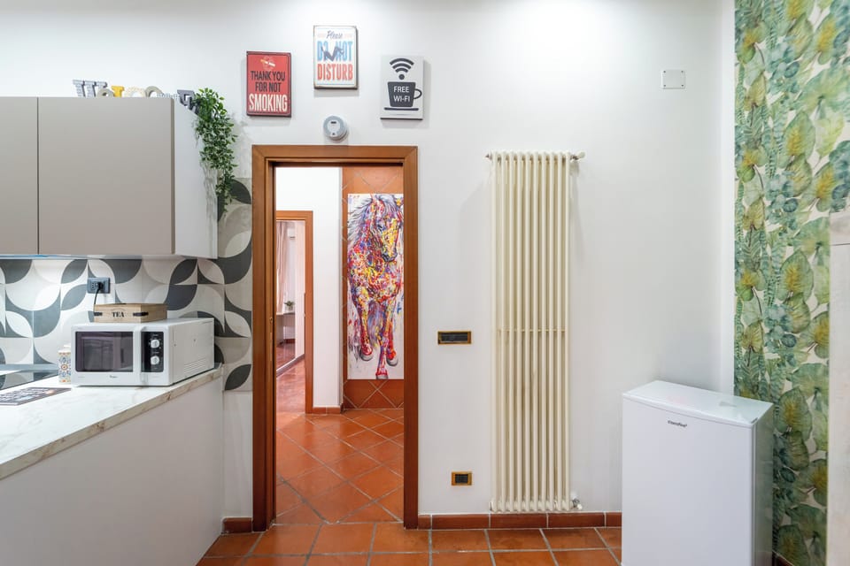 Apartment | Private kitchen | Electric kettle, dining tables
