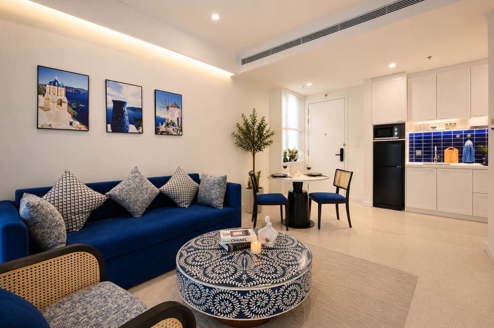 Deluxe Apartment, 1 Bedroom, City View | Living area | 55-inch TV with satellite channels