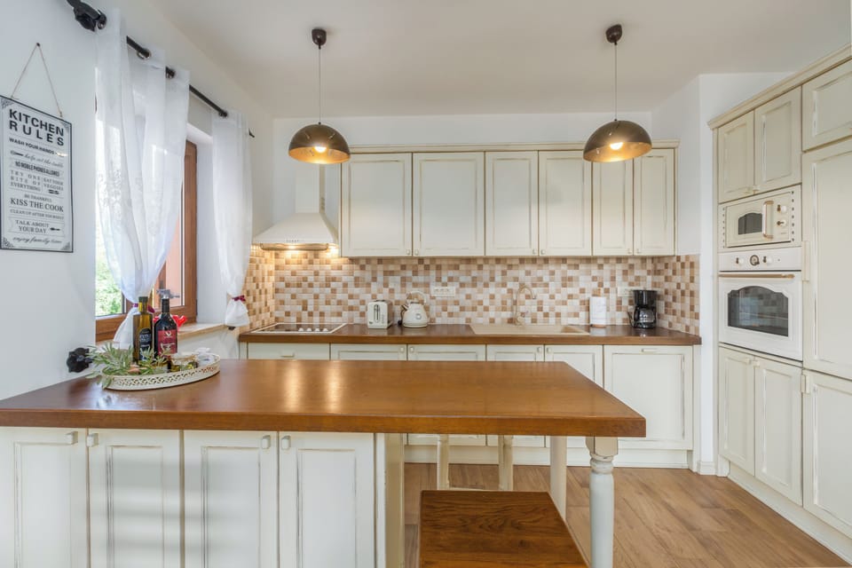 Villa, 4 Bedrooms | Private kitchen | Full-size fridge, microwave, oven, stovetop