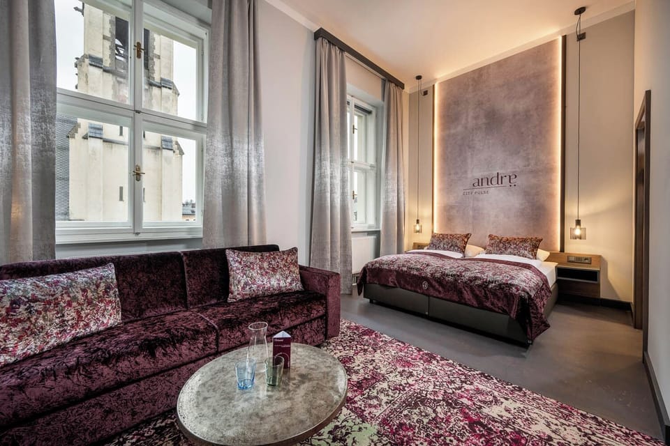 Comfort Quadruple Room, Courtyard View | In-room safe, blackout drapes, soundproofing, free WiFi