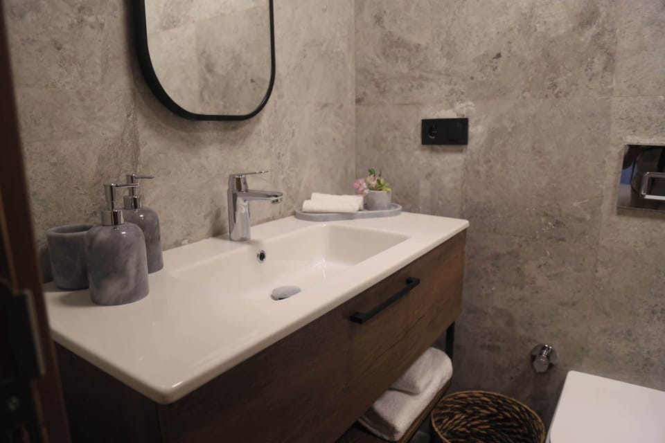 Shower, free toiletries, hair dryer, slippers