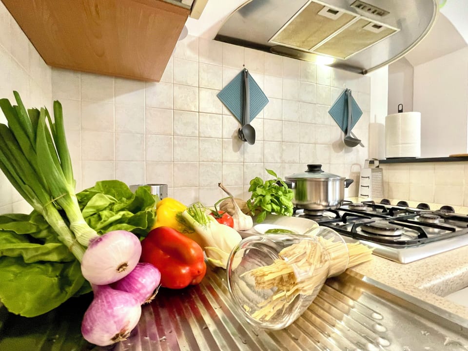 Family Apartment | Private kitchen | Fridge, microwave, oven, stovetop