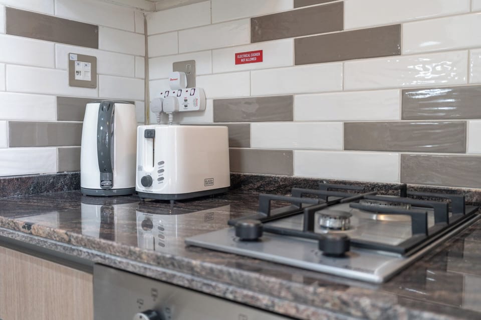 Superior Studio, Balcony, City View | Private kitchen | Fridge, oven, coffee/tea maker, toaster