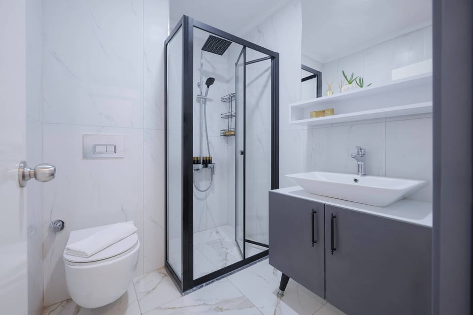 Shower, free toiletries, hair dryer, towels