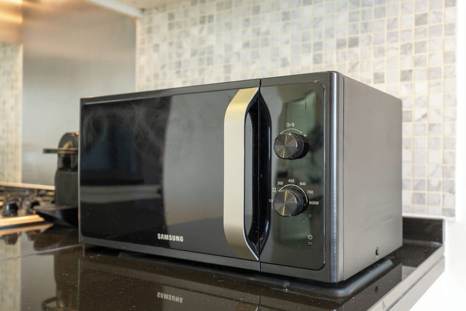 Classic Apartment, Balcony, City View | Private kitchen | Fridge, microwave, oven, stovetop