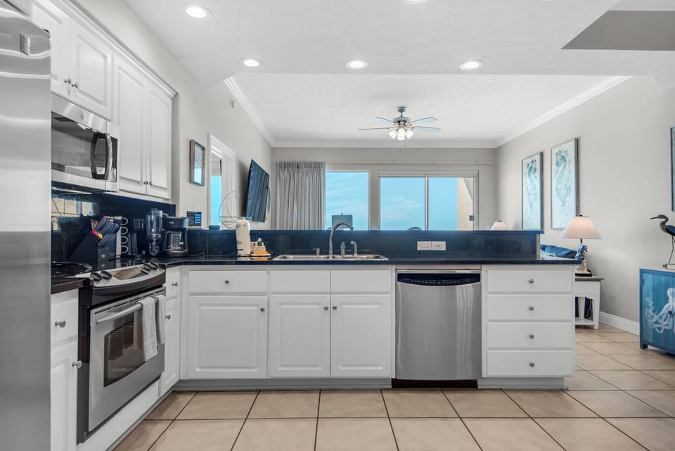 Condo, Multiple Beds, Balcony, Ocean View (Treasure Island 0506) | Private kitchen | Fridge, microwave, oven, stovetop