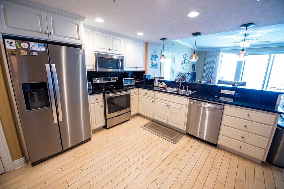 Condo, Multiple Beds, Balcony (Treasure Island 1910) | Private kitchen | Coffee/tea maker, fridge, microwave, oven