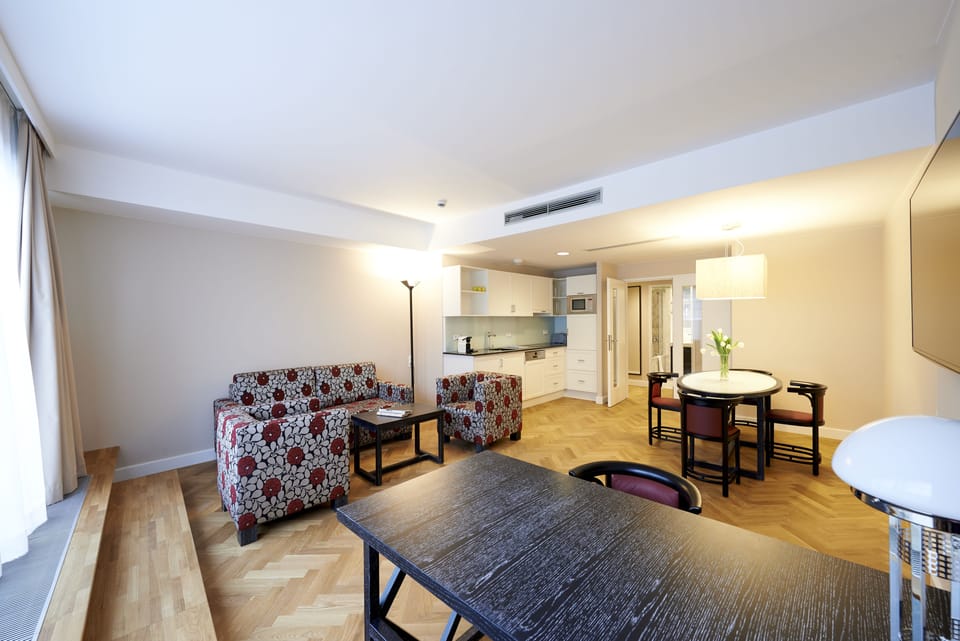 Executive Apartment, 1 Bedroom | Living room | Flat-screen TV, iPod dock