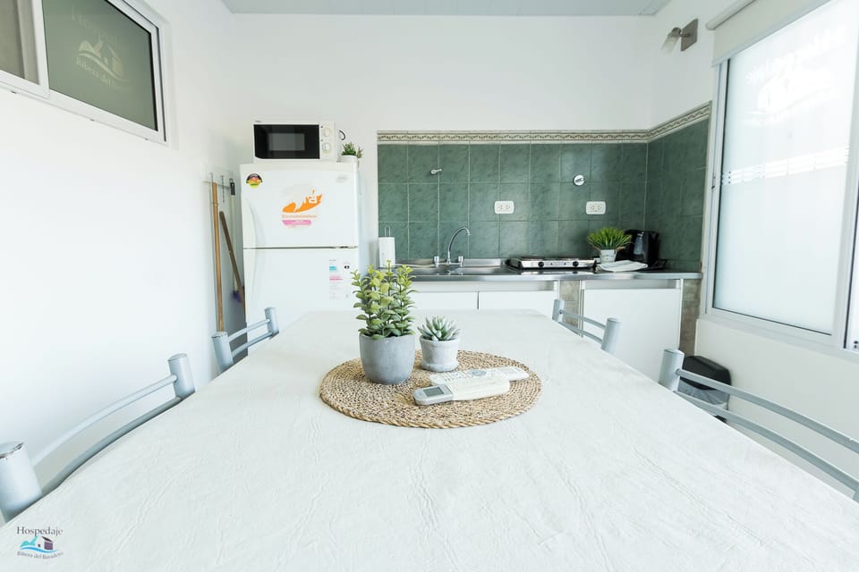 Family Room | Private kitchen | Full-size fridge, microwave, stovetop, cookware/dishes/utensils